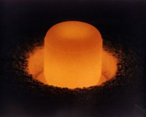 A glowing cylinder of 238PuO2